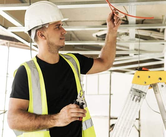 An electrical contactor checking wires